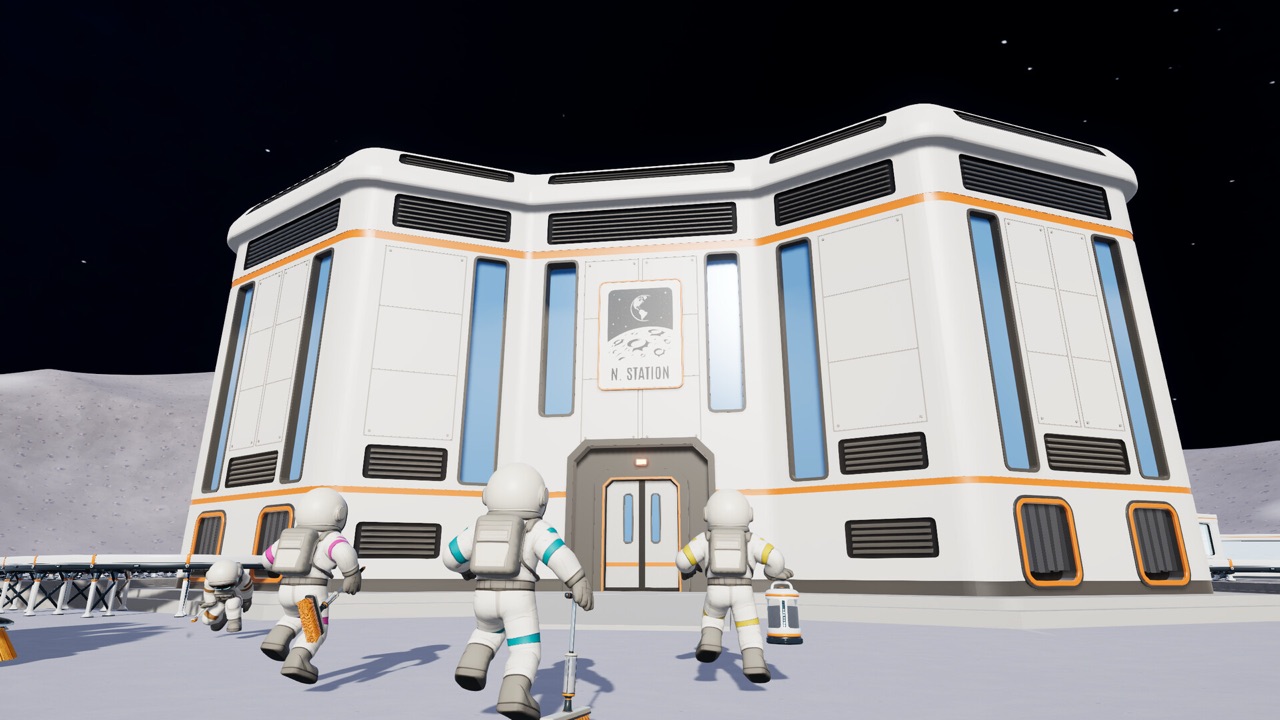 A crew of astronauts walking toward a large lunar building